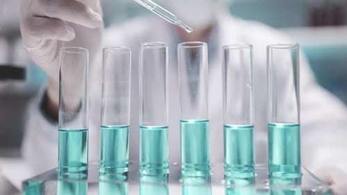 Scientist working research on virus cure in the laboratory, chemical drop research for medical test