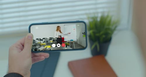 Woman Teaching Online Class on Mobile Phone