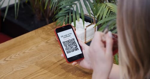 Phone Displays Covid-19 Vaccine QR Code