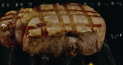 Delicious Filet Mignon Steaks On Grill With Flames 23b