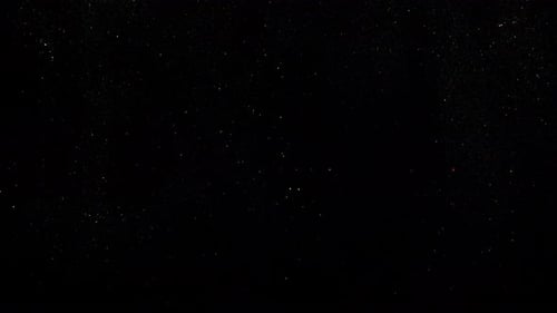 Sparkling Particles Floating in Dark Space