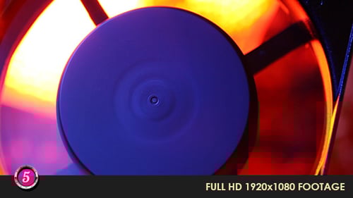 Rotating Computer Fan with Red and Yellow Lighting