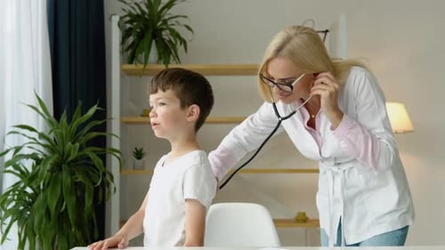 Senior Female Doctor Pediatrician Nurse Wear White Coat Listening Heartbeat Exam Cute Little Patient