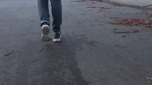 Person Walking on an Urban Street