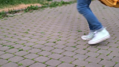 Spinning Legs of School Girl Close Up