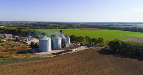 Silver Silos on Agro Manufacturing Plant