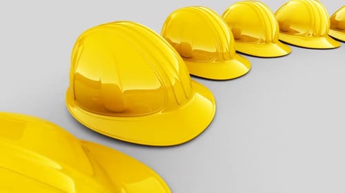 Seamless animation of the circular array of yellow safety helmets. Loopable. HD