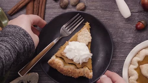 Slice of Pumpkin Pie with Whipped Cream