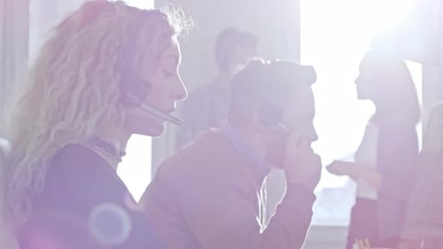 Blond Call Centre Operator Calling Client