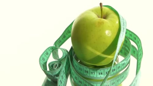 Beautiful, Sporty Woman Drinking Water, on Black, Close Up
