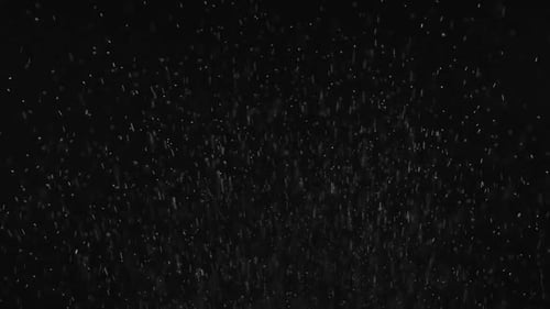 Abstract Falling Rain Droplets on Black Background