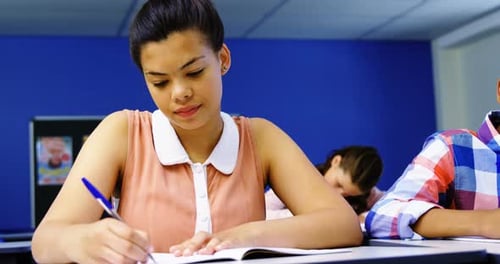 Focused Student Writing in a Classroom