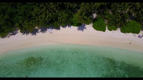 Aerial drone shot landscape of beautiful lagoon beach journey by clear water with white sandy backgr