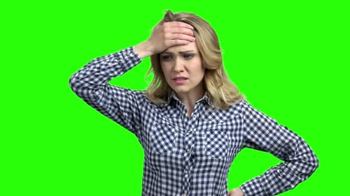 Young Stressed Woman on Green Screen
