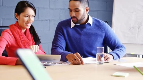 Business Professionals Collaborating in Modern Office Meeting