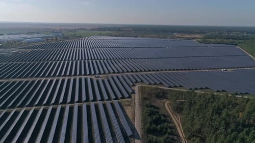 Flight Over Solar Panel Farm. Renewable Green Alternative Energy