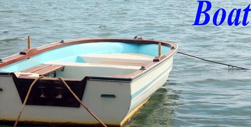 Vibrant Boat Gently Bobbing in Serene Water