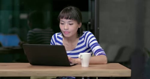 Woman Watch on The Laptop Computer