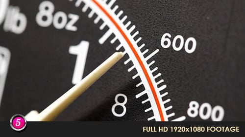 Scale Needle Measures Weight or Data in Detail
