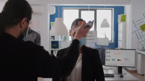 Temperature Checks for Employees at Office Entrance