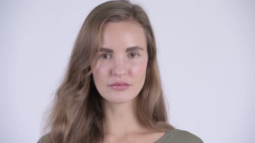 Close Up of Woman with Wavy Hair Smiling
