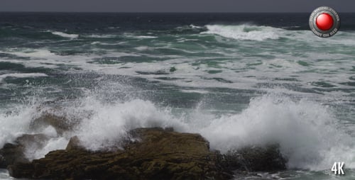 Waves Crashing on Rocky Coastline