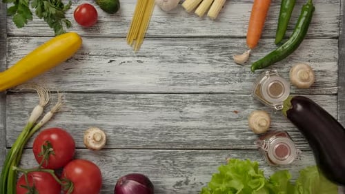 Vegetables and Pasta Placed on Wooden Table