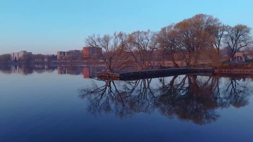aerial peaceful sunrise over a lake