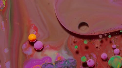 Colorful Liquids with Floating Globules Abstract Close-Up Shot