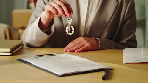 Real Estate Agent Holding Home Keys Closeup Woman Realtor