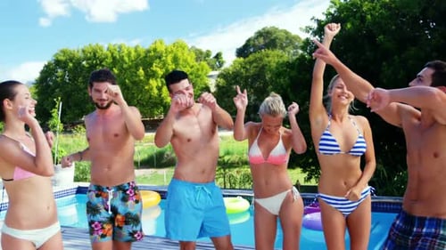 Friends Enjoying Pool Party on Summer Vacation