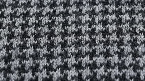 Knitted Fabric Close-Up with Gray Geometric Pattern
