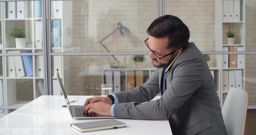 Asian Manager at Workplace