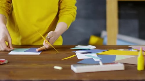 Crafty Hands Making Colorful Paper Art Project