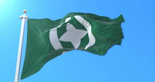 Waving Green Flag with Islamic Star and Crescent Symbol