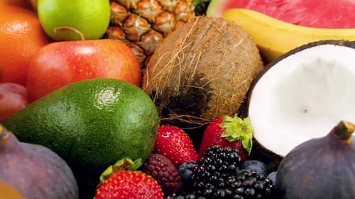 Tracking Dolly Video of Lots of Fresh Tasty Fruits and Berries