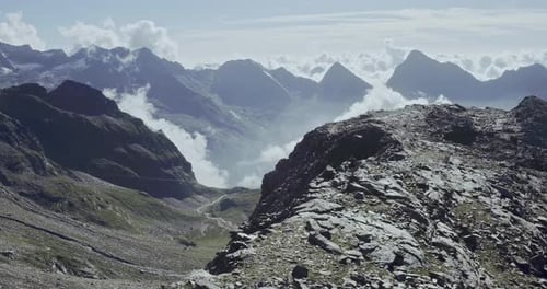 Aerial of Man Run on Ridge Edge