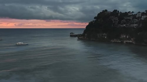 Aerial Dramatic Sunset with Thunder Clouds Over Sea