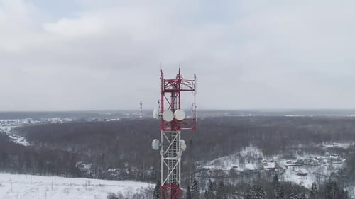 Telecommunication Tower Against the Sky and Aerial View To the Telecom Antena