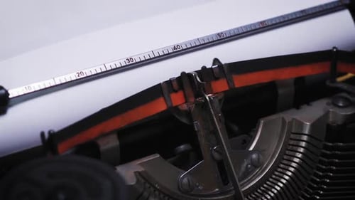 Word Chapter on Paper in an Old Typewriter