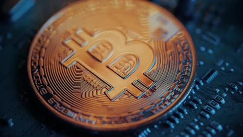 Golden Bitcoin Coin on Green Circuit Background