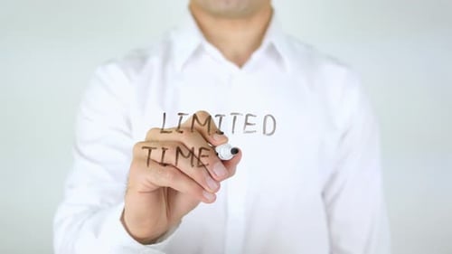 Man Writes Limited Time Only with Marker
