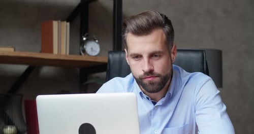 Tired Worker Overworked on Computer