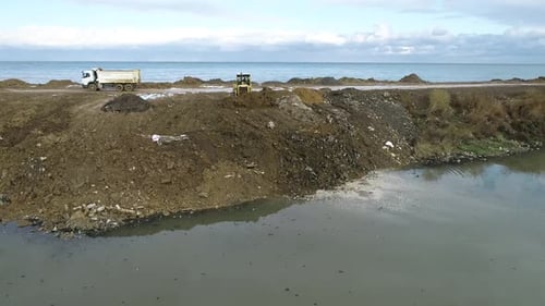 Künstlich Land aus dem Meer schaffen