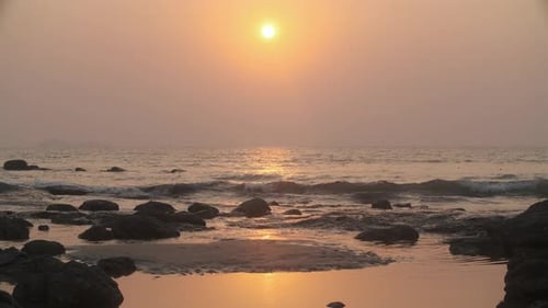 Quiet beach scene at sunset