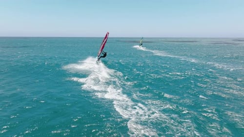 Rider Performing Extra Speed and Power By the Sail Catching the Wind