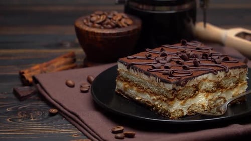 Tiramisu Slice with Coffee and Chocolate Still Life