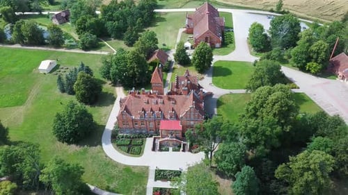 Jaunmoku Brick Medieval Castle Near Tukums, Latvia Aerial Dron 4k Shot Jaunmokas Manor Park.