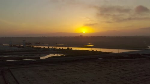 Aerial View of Waterway During Beautiful Golden Sunrise