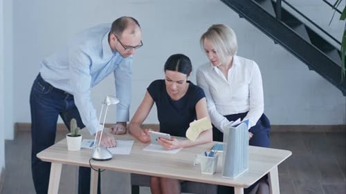 Workplace in Modern Office with Business People Using Digital Tablet